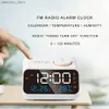 طاولة المكتب ساعات Mordern FM Radio LED Clock Clock للاستيقاظ بجانب السرير. تقويم الجدول الرقمي مع مقياس رطوبة مقياس الحرارة .24327