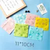 Sacs de rangement 100pcs / lot dessin animé impression sac en plastique transparent alimentaire collation nécessités quotidiennes décorations cosmétiques masque facial