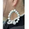 البيع بالجملة مبالغ فيه بالخرز الخشبي الخشبي المسلسلات سلسلة رياضات Hoop earrangs للمرأة