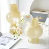 Vaser glas vas ljus lyx estetisk blommor arrangemang dekoration