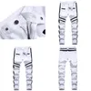 Męskie dżinsy punk Men Zipper Hip Hop Slim Fit White Rower Elastic Split Podzielone dżinsowe spodnie bawełniane moda swobodne jogging męskie ubranie 230909 Dr otqds