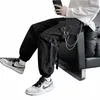 Мужские брюки-карго с боковыми карманами 2023 Новинка Ribbs Черные хип-хоп Повседневные мужские брюки для бега Fi Повседневные уличные брюки 62xv #