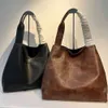 Designer Mius Bag Muimui Mui Mui Miaos Sacola Coreana Nova Hobo Ombro Grande Capacidade Bolsa Único Ombro Axilas Bucket Bag para Mulheres