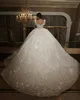 Luxur Crystal Ball Gown Wedding Dress for Bride Bodice Sheer Pärlor Neck Korta ärmar Paljetter Bröllopsklänningar Dubai Saudi Arabic Sweep Train Qatar Brudklänningar