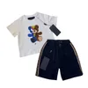 T-shirt classiche per bambini Tute estive Set due pezzi Stili multipli Tute per ragazzi e ragazze Taglia 100-150 bambino Maniche corte in cotone e pantaloncini stampati con lettere a griglia Jan P03