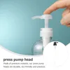 Dispensateur de savon liquide 4pcs têtes de pompe Emulsion Remplacement en plastique Pompes de presse (28 mm noir) Bouteille