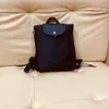 Sac à main de styliste pour femmes, vente de sacs de marque chaude à 50% de réduction, nouveau sac à dos en Nylon pour femmes, grande capacité, tissu pliable, tendance