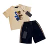 T-shirt classiche per bambini Tute estive Set due pezzi Stili multipli Tute per ragazzi e ragazze Taglia 100-150 bambino Maniche corte in cotone e pantaloncini stampati con lettere a griglia Jan P03