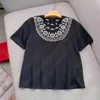 Kvinnors T-skjortor Retro Etnisk stilmönster uthärde broderi chic design svart bomull t-shirt topp kvinnor vår sommar 2024