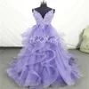 Gracieful Violet Purple Prom Dresses 2024 A Line Tulle Tiered Ruffles aftonklänningar Sexiga spaghettirandor Golvlängd Spetsform Formell klänning Elegant Special tillfälle