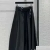 Spódnice dla kobiet projektantka mody midi czarna moda highwaist z muszką i zamkiem w talii wersja A-line SML FZ0306140 DROP DEVIV OTUAQ