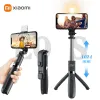 Sticks Xiaomi Selfie Stick bezprzewodowy Bluetooth Kompatybilny składany mini statyw do telefonu z wypełnieniem światła migawki pilot statyw