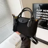 Il designer di borse a tracolla vende borse da donna di marca calde con uno sconto del 50% e una nuova borsa a tracolla piccola e popolare con gnocchi, borsa alla moda per le donne