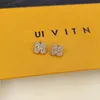 Lyxguldpläterade örhängen Fashion Designer Högkvalitativ Diamond Inlay New Charming Women's Earrings Romantic Love Matching Box