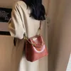 Diseñador de moda de lujo Bolsos cruzados Bolso de cubo de moda y moderno bolso cruzado simple y elegante de un hombro para mujer de gran capacidad