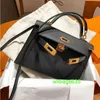 Ky Tote Bags Sac à main en cuir de luxe de confiance 2024 Nouveau sac femme Mini deuxième génération Mini petit sac en cuir véritable première génération français ont le logo HBKW