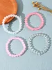 4 peças de pulseiras de cura de corda elástica com contas coloridas