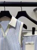 Kadın Bluzları 2024 Kadın Kontrast Stripes Suit Down Down-Down yaka kolsuz kısa üst veya yüksek bel cep A-line etek