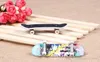 Finger Toys Hildren Animazione Modello vicino Board Truck Mini lega Abs Skateboard Giocare a skateboard C034 Regali di consegna di goccia Nov Dhzuy