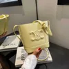 De Designer Triomp Bag Mini Fashion Tote حقيبة جديدة من الجلد الأصلي عالي السعة