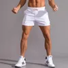 Män bomullsvita shorts som kör sport Homme Gym basketjoggare Elastic Casual Streetwear Male Clothes 240315