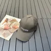 Unisex designer boll kepsar korrekt utgåva bokstäver avslappnad elegant par baseball cap grossist