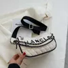 Projektantka torebki 2024 torebki Unikalne letnie damskie miękkie skórzane niszowe sieć niszowa stylowa szerokopasmowa crossbody dla kobiet