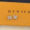 Lyxguldpläterade örhängen Fashion Designer Högkvalitativ Diamond Inlay New Charming Women's Earrings Romantic Love Matching Box