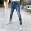 Jeans pour hommes Designer Marque Tendance Industrie lourde Imprimé pour l'été Style mince Mode personnalisée Slim Fit Petits pieds Pantalons longs F8DM