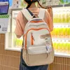 Mochila de alta capacidade para estudantes do ensino médio, jovens, viagens de lazer, pode acomodar uma bolsa para laptop de 15 polegadas