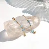 Bolzenohrringe Lii Ji Schweiz Blau Topaz Amerikaner 14K Gold gefüllt nieren Stein handgefertigter Schmuck