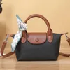 Shop crossbody bolsa exportar barato textura exclusiva 2024 novo couro genuíno feminino versátil mini bolsa de bolsa de bolsa de ombro