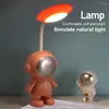 Luci notturne Lampada da comodino per dormitorio studentesco Ricarica USB Protezione per gli occhi dell'astronauta Pieghevole a 360 ° per Soggiorno camera da letto