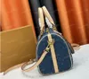 Denim designer väska mode crossbody väska speedybag mångsidig kvinnors väska bokstav design kudde sommar axelväska bifogad 25x19x15cm m40390