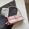 Drawstring moda kadın omuz çantaları düz renk taş desen altı 2024 zarif bayan banliyö telefon cüzdan çantası