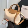 Sac à bandoulière Boutique Exportation bon marché grande capacité pour les femmes 2024 Nouvelle et polyvalente.