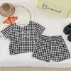 Set di abbigliamento Versione coreana Estate Bambini Neonate Ragazzi Manica corta Stampa waffle Top T-shirt Pantaloncini Pantaloni Infantile Carino Set in puro cotone