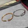 Topp lyxig fin designer smycken 18k guld cheetah huvudarmband kvinnlig personlighet full diamantöppning leopard armband manlig djur original 1to1 med riktig logotyp