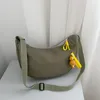 Axelväskor 2024 nylon tyg messenger väska kvinnlig mode koreansk version dumpling crossbody lätt armhål singel