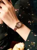 ساعة معصم رجعية على شكل برميل على شكل كوارتز حزام المرأة