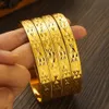 24k 65mm Dubai Bröllopsbäldar för kvinnor Etiopiska smycken Guldfärg Indiska armband Jämband Kvinnor födelsedagsmycken gåvor 240327