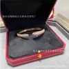 Topp lyxig fin designer smycken 18k guld cheetah huvudarmband kvinnlig personlighet full diamantöppning leopard armband manlig djur original 1to1 med riktig logotyp