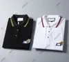 24SS Men Designer Tee Polo koszulki męskie haft kieszonkowy Druku