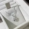 1: 1 Colliers de créateurs haut de gamme pour femmes Version haute Collier avec croix Tiffins pour femmes Pendentifs en diamant en forme de X en or rose 18 carats avec logo original Tiffin