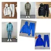 Ensemble Designer Trailtsuit Homme Homme kapüşonlu yakalı fermuar ekleme uzun kollu trençkot bacaklar ve pantolonlar ile iki parçalı set gevşek spor vahşi trend vahşi trendler serin