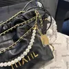 Women Designer Black DrawString 22 Mini Shopping Bag Pearl Chain Round Strap Gold Metal Hardware Matelasse Crossbody Axel Handväska stor kapacitetsväska 18x20 cm