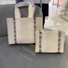 5A Women Women Handbags Woody Tote Forming حقيبة يدوية عالية من نايلون الأزياء أزياء الكتان الكبيرة حقائب شاطئية فاخرة مصممة كروس جاسودي