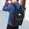 Mochila impermeável tecido estudante fivela mochila masculino feminino com interface de carregamento USB fone de ouvido