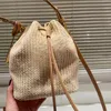 Nouveau sac tissé en paille sac seau super populaire sac à bandoulière simple décontracté et polyvalent léger et pratique super beau haut du corps taille 15*23 CM