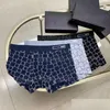 Calzoncillos Nuevo algodón de lujo para hombre ropa interior diseñador boxeadores suave transpirable carta hielo jirones pantalones cortos diseño cintura apretada hombres gota d othwf